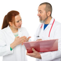 two doctors arguing over patient results two doctors arguing over patient results