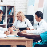 Healthcare professionals meeting in conference room