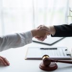 doctor shakes lawyer hand doctor shakes lawyer hand