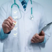 Doctor marking a digital checklist symbolizes medical accuracy quality healthcare management clinical workflow efficiency and professional standards in modern patient care environments Doctor marking a digital checklist symbolizes medical accuracy quality healthcare management clinical workflow efficiency and professional standards in modern patient care environments